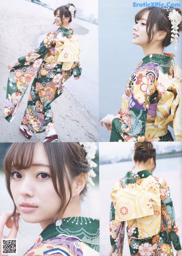 A woman in a kimono is posing for a picture.