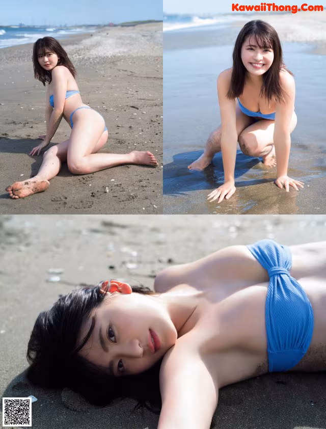 A woman in a blue bikini laying on the beach.