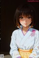 Anime girl in a kimono with a flower in her hair.